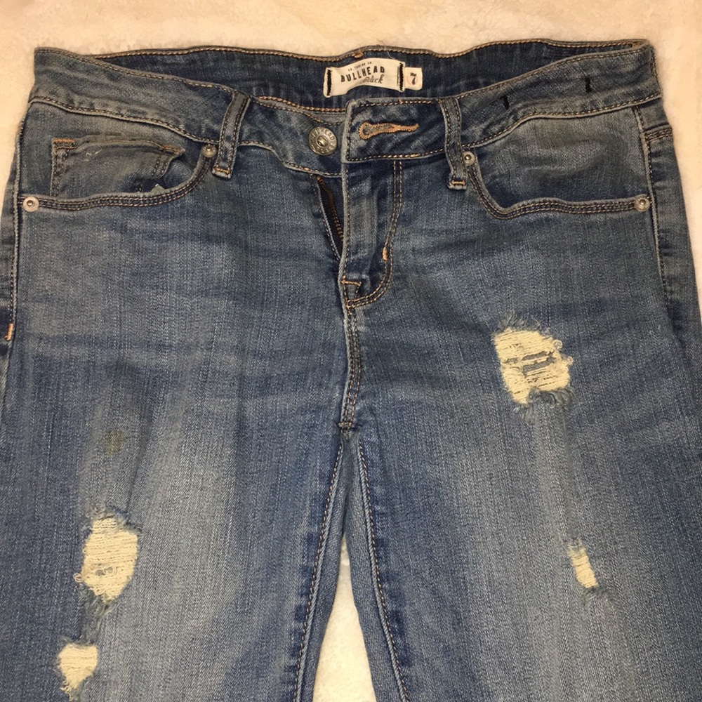 Light wash ripped skinny jeans